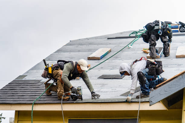 Professional Gutter Installation technician working in Miami, WV